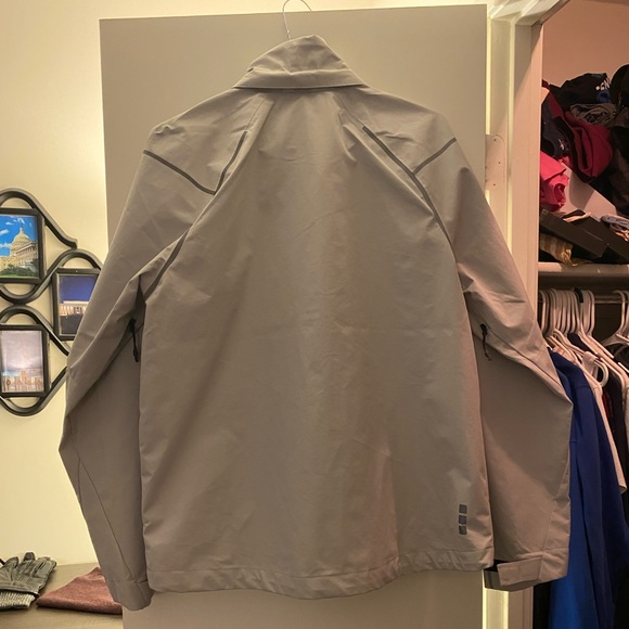 Rain jacket windbreaker in a light tan color NWT - Picture 2 of 3
